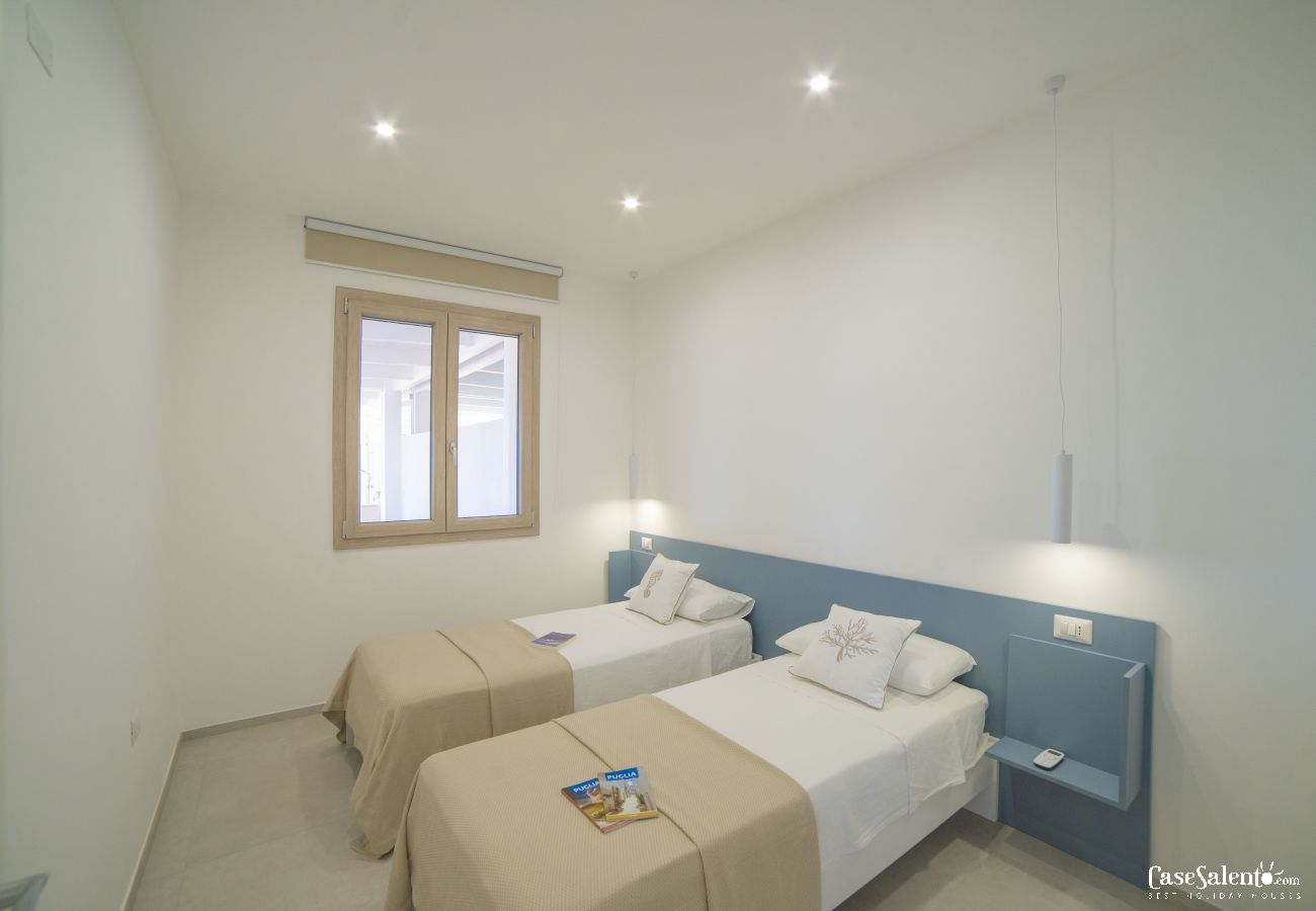 Appartement à Lido Marini - Maison piscine plage vue mer climat WiFi m621
