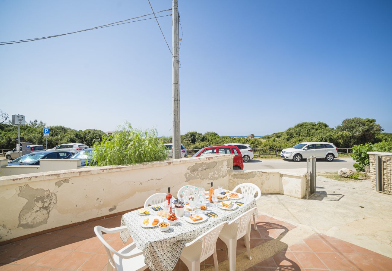 Chalet à Lido Marini - Villa pieds dans l'eau avec vue mer, sable fin v780